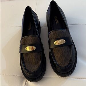 Michael Kors Black and Brown Women's Loafers. Size 9.5 are available.